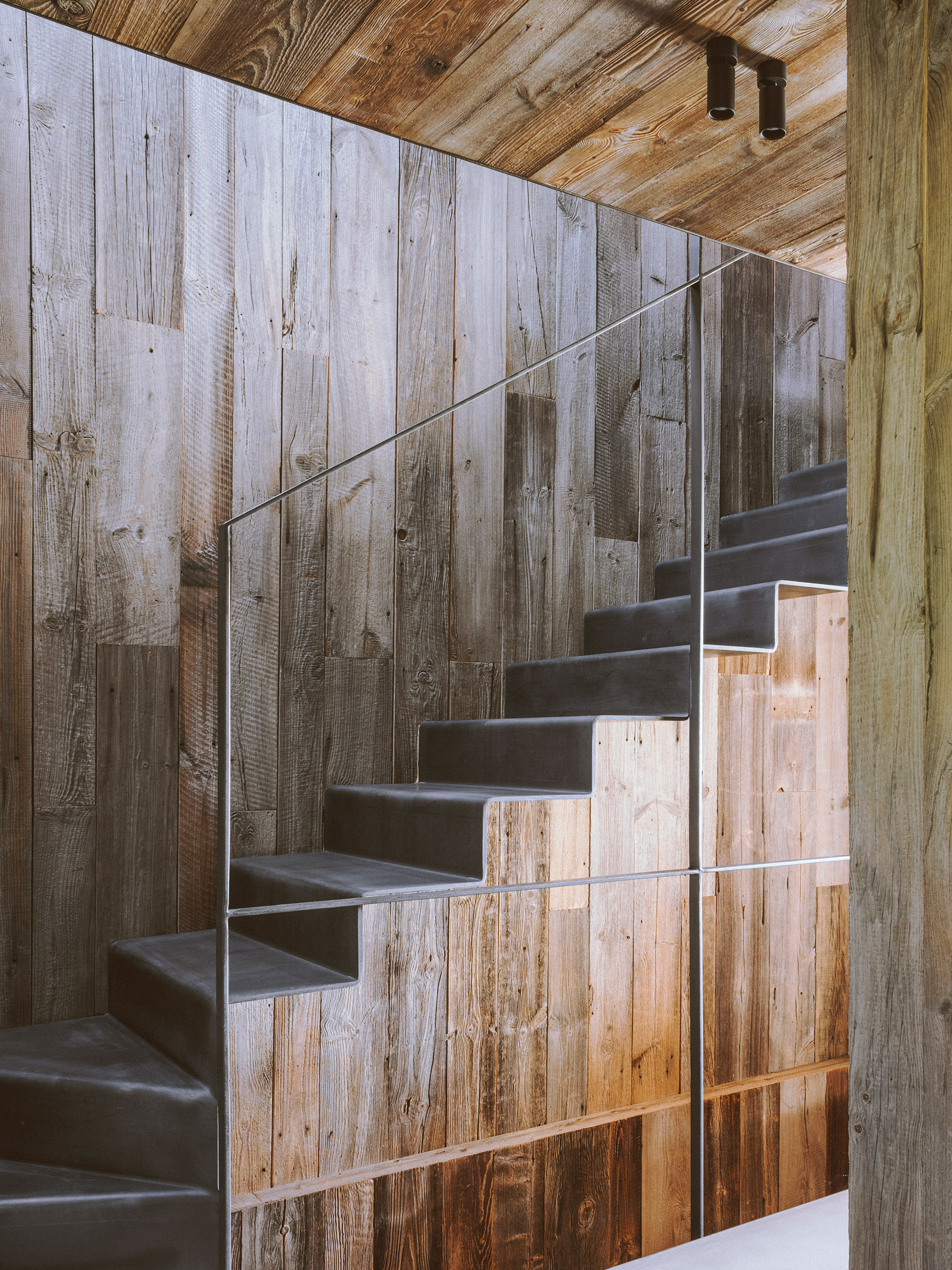 Rustic alpine chalet, stainless steel staircase