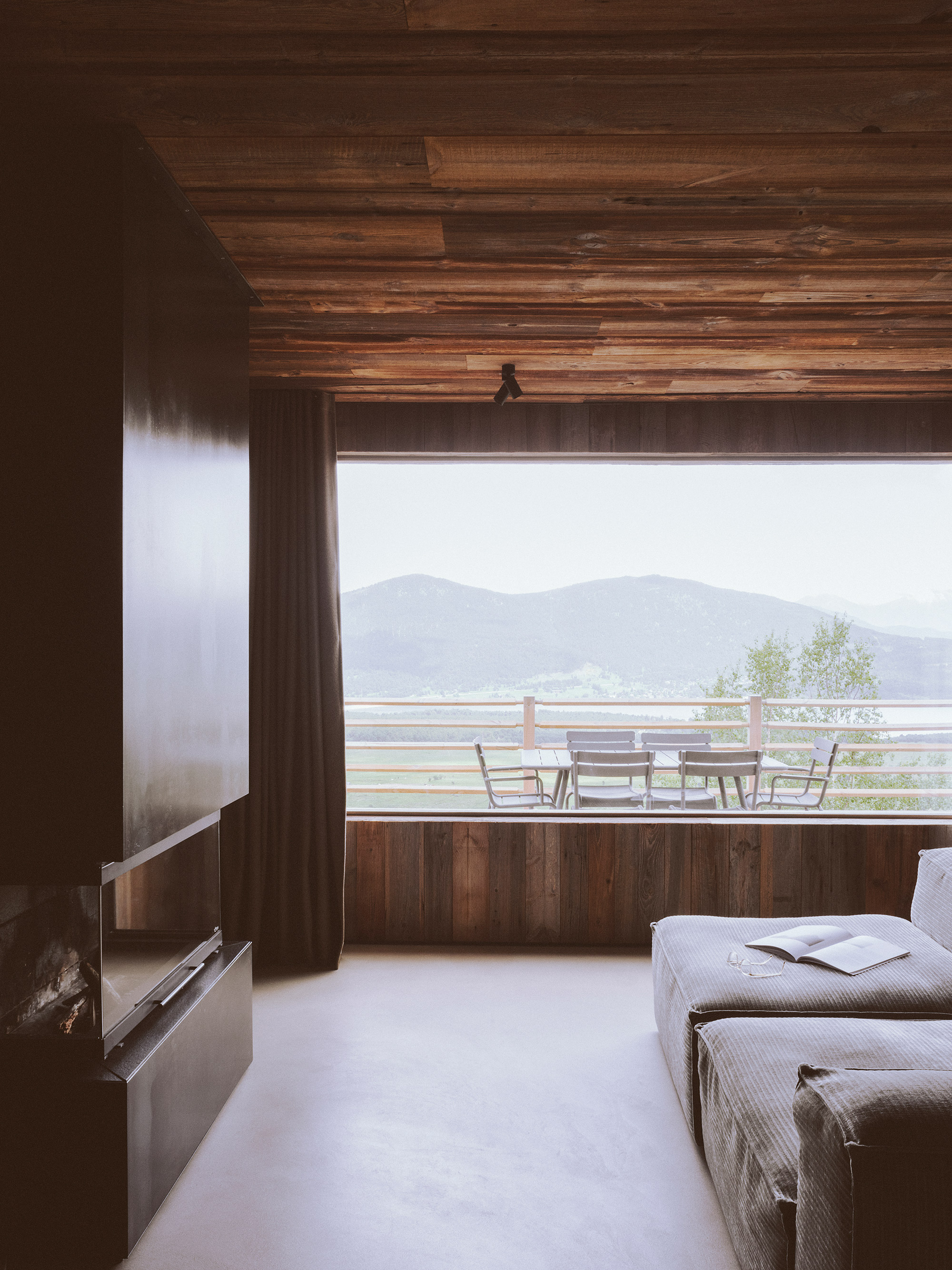 Rustic alpine chalet, oversized livingroom window