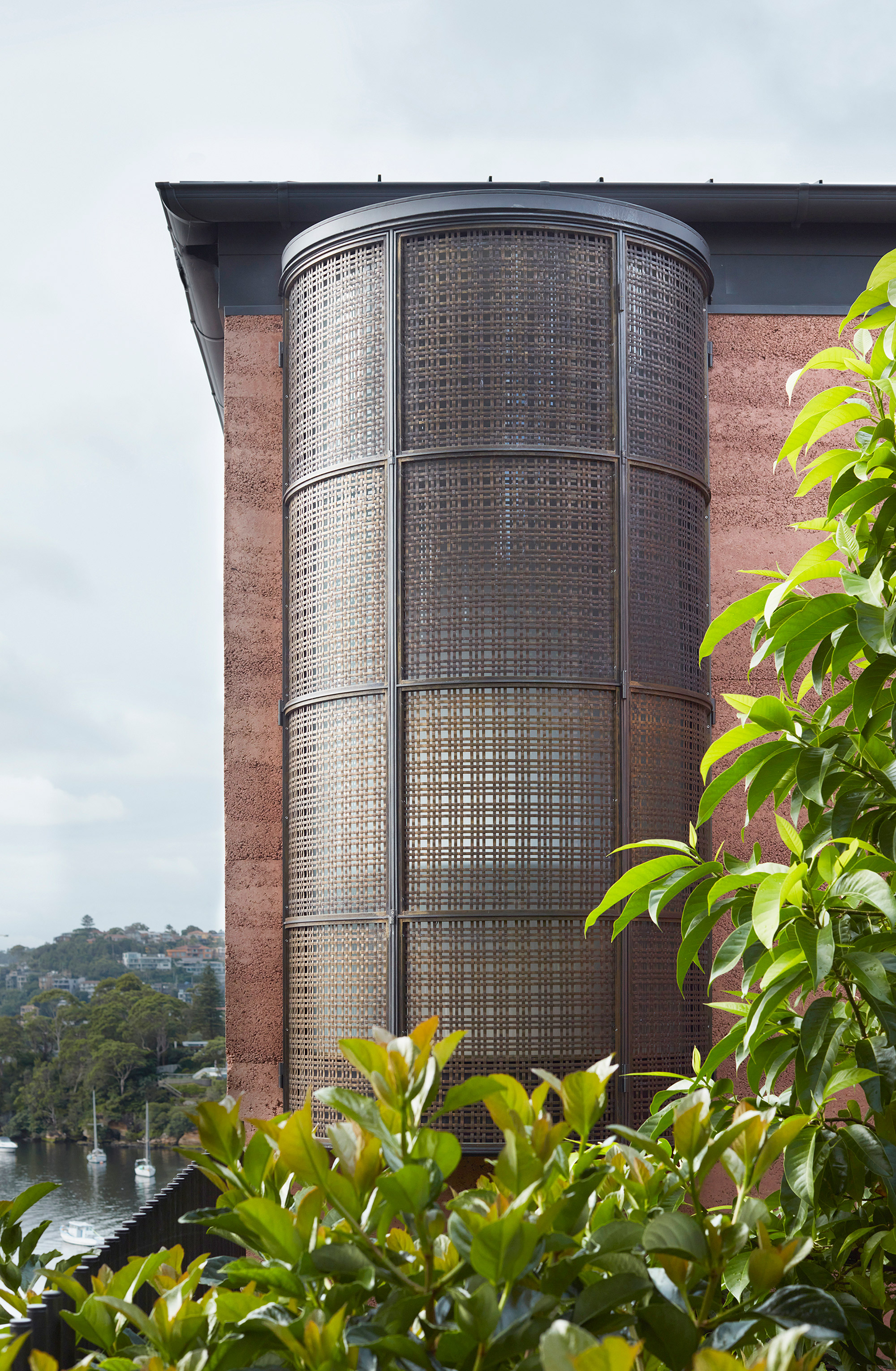 Earth-Ship house by Luigi Rosselli. cylindrical exposed window