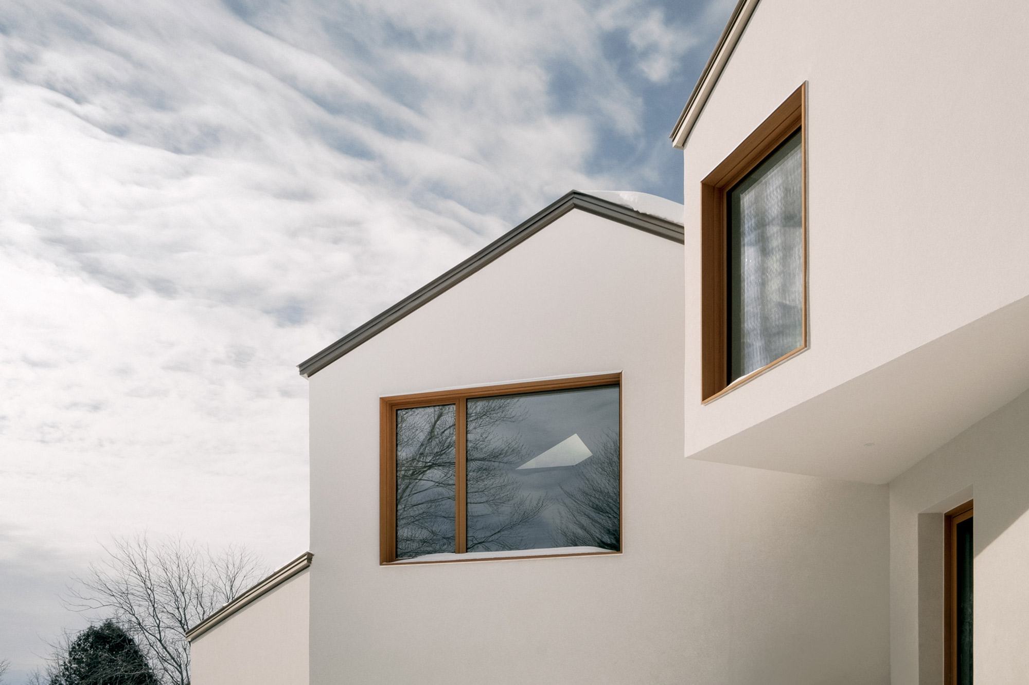 Norm House by Alain Carle Architecte, front windows