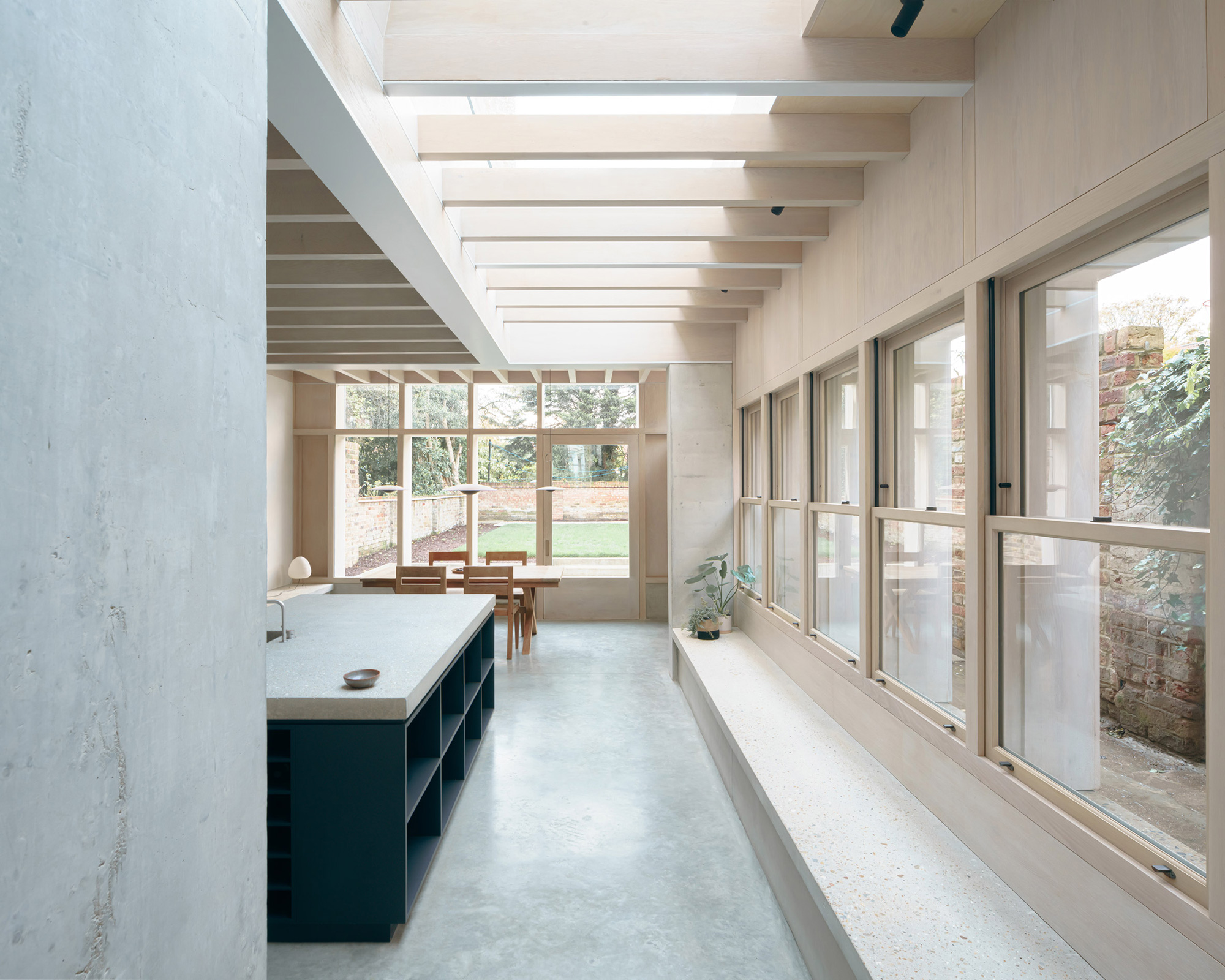 Concrete Plinth House by DGN Studio, kitchen