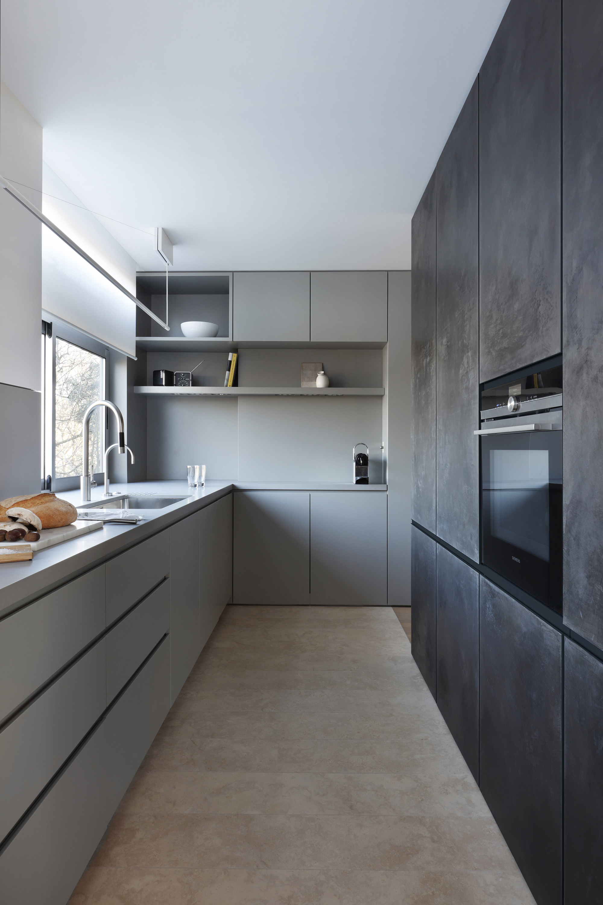 Oakhill Apartment by MWAI Architects, grey modern kitchen