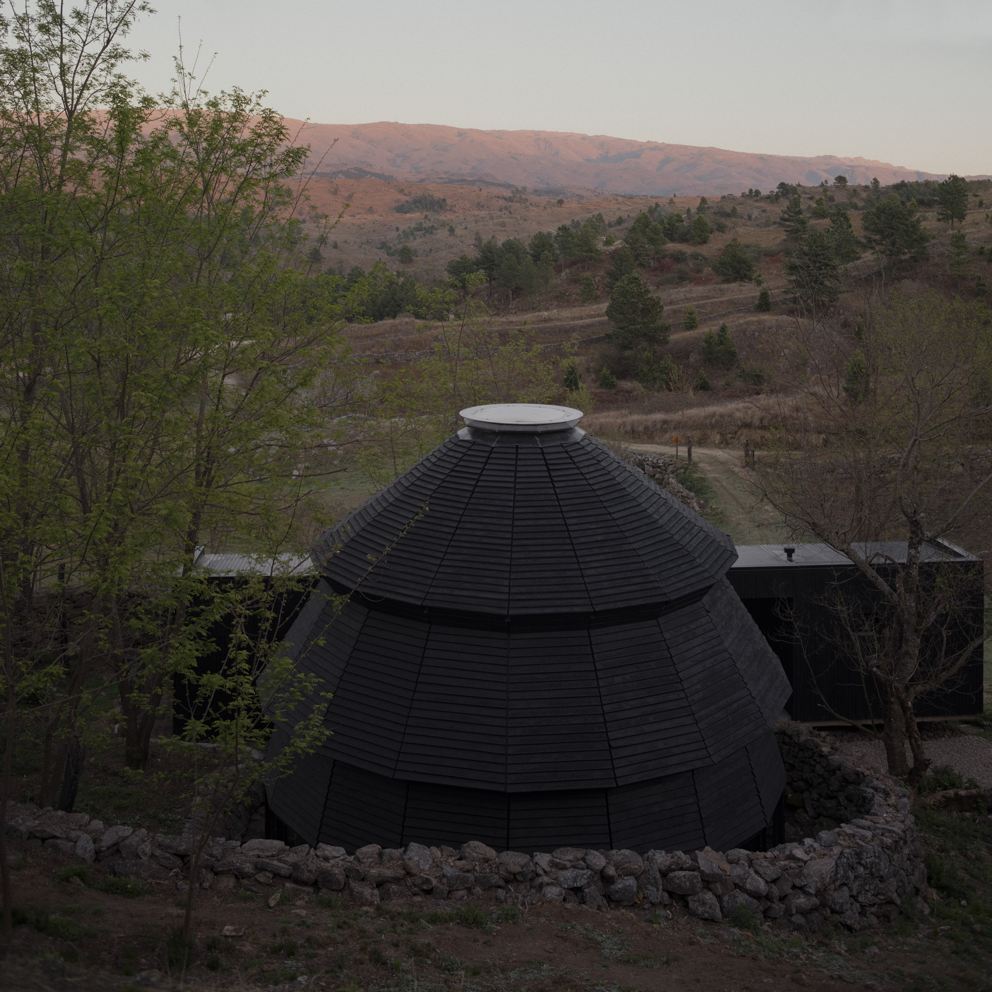 A Black Timber Pavilion in the Argentine Sierras - Gessato