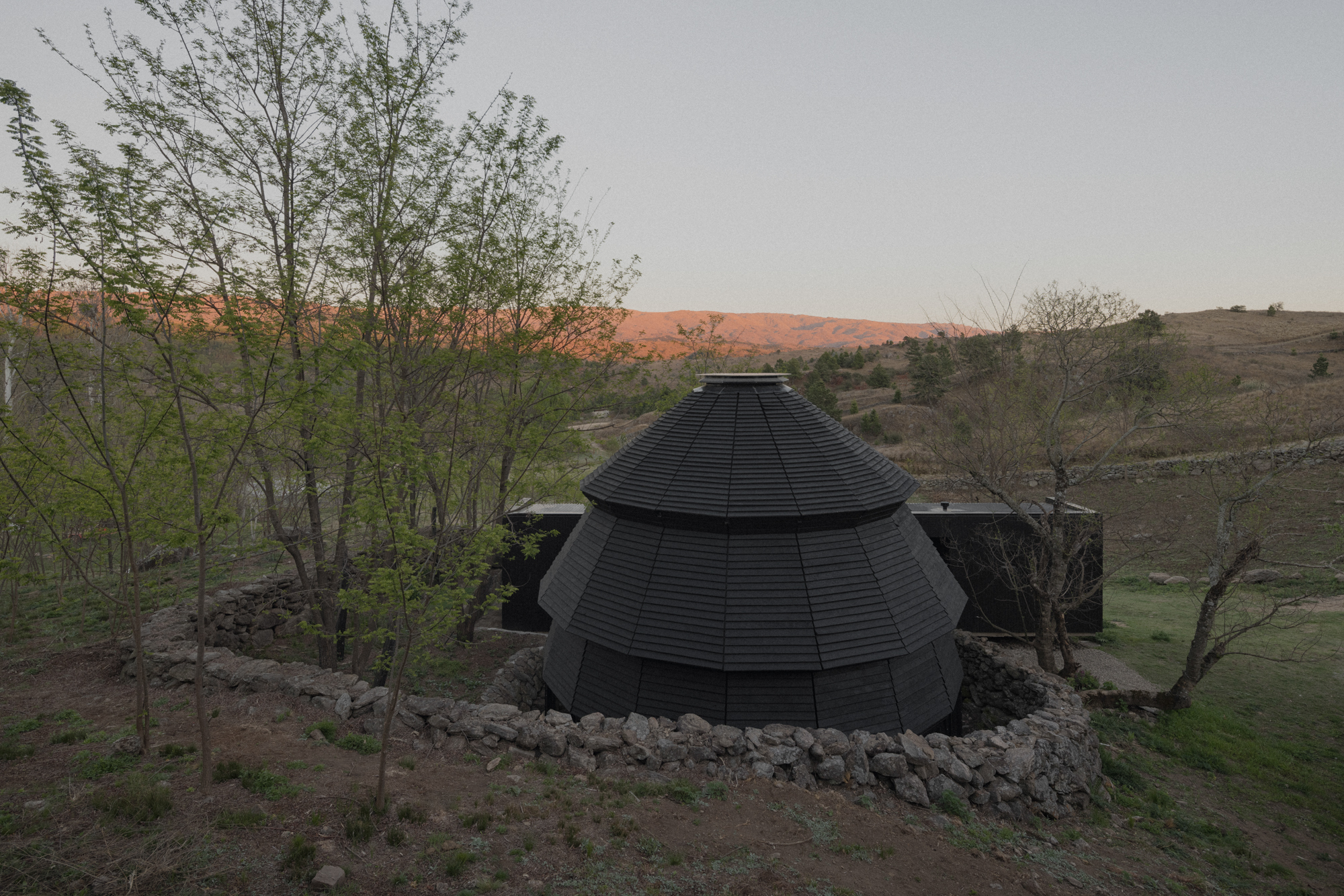 A Black Timber Pavilion in the Argentine Sierras - Gessato