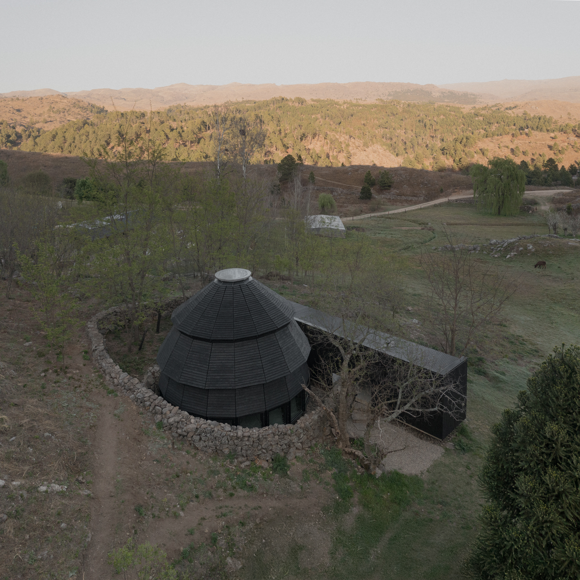 A Black Timber Pavilion in the Argentine Sierras - Gessato