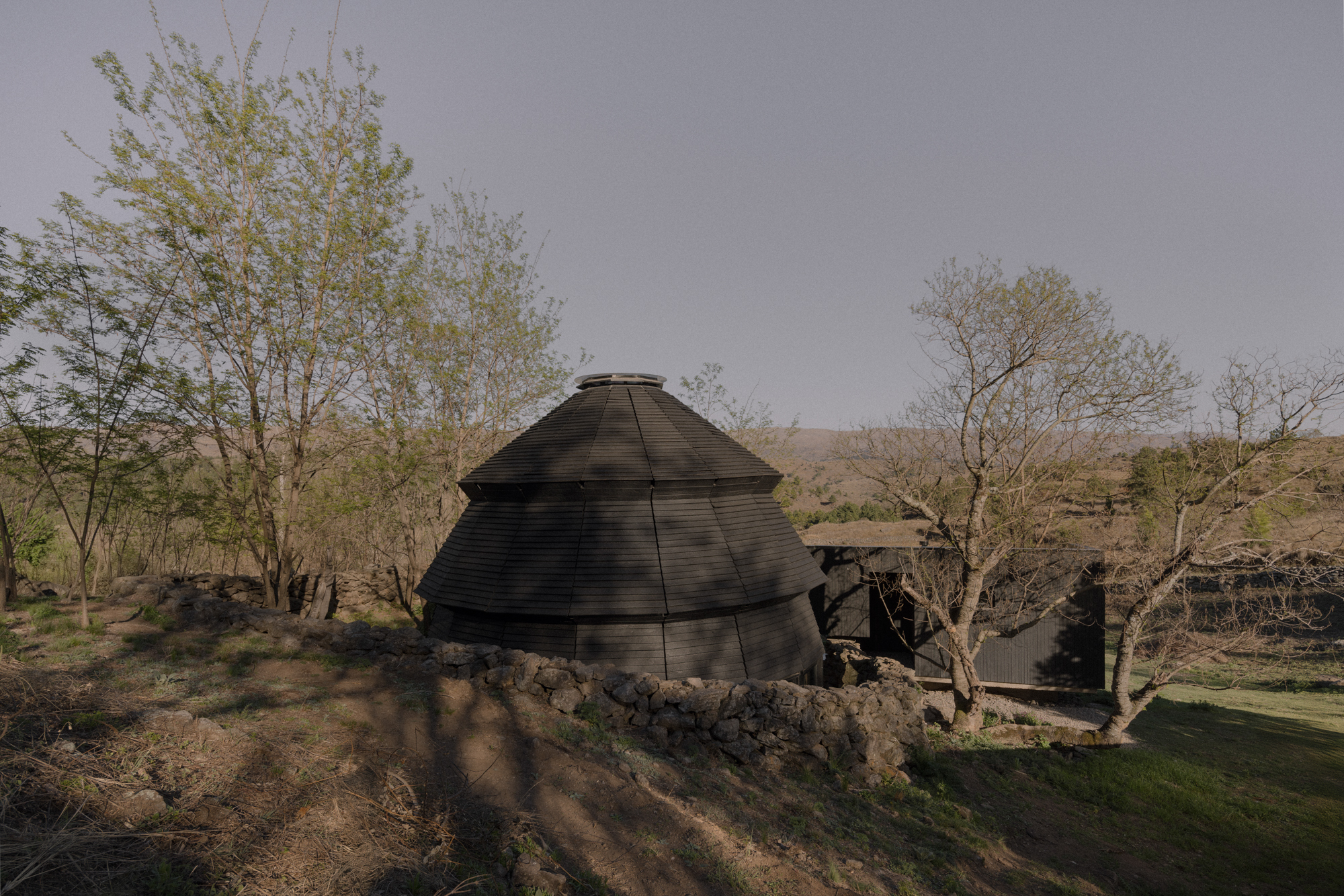 A Black Timber Pavilion in the Argentine Sierras - Gessato